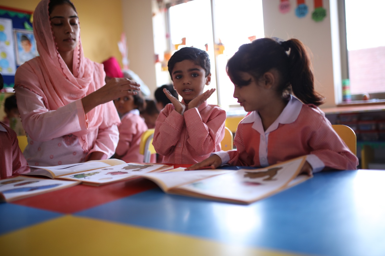 Teacher guiding students